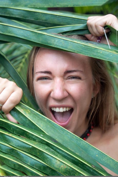 Bashful teen Rena A takes off everything on a blanket in a secluded area
