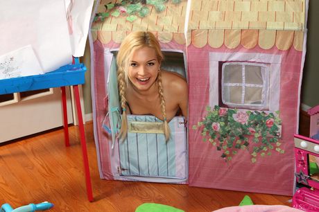 Blonde amateur Franziska Facella strips and teases with her tiny tits