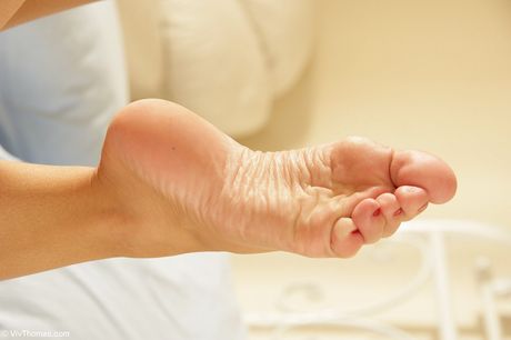 Tender teen Claudia A removes her stockings to get naked in heels