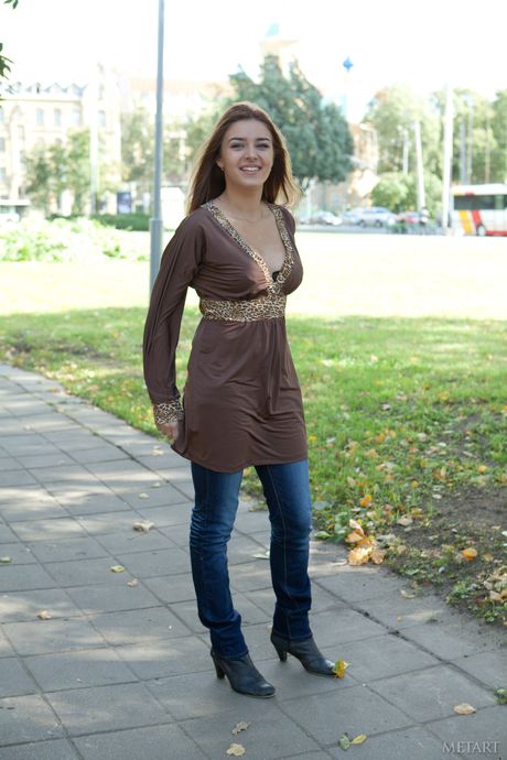 Adriana F displays her big boobs and shaved pussy