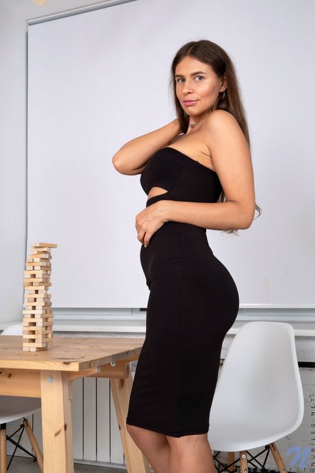 Hot teen Kate Forest shows her big boobs and pierced pussy in a solo