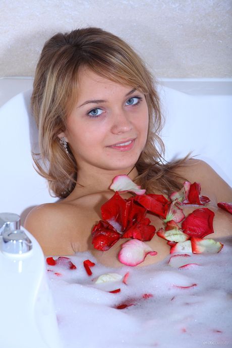 Cute teen Lada D takes a shower while totally naked in a bathroom