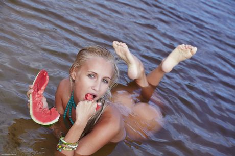 Thin teen Afina strips naked & spreads her legs to show her bald pussy