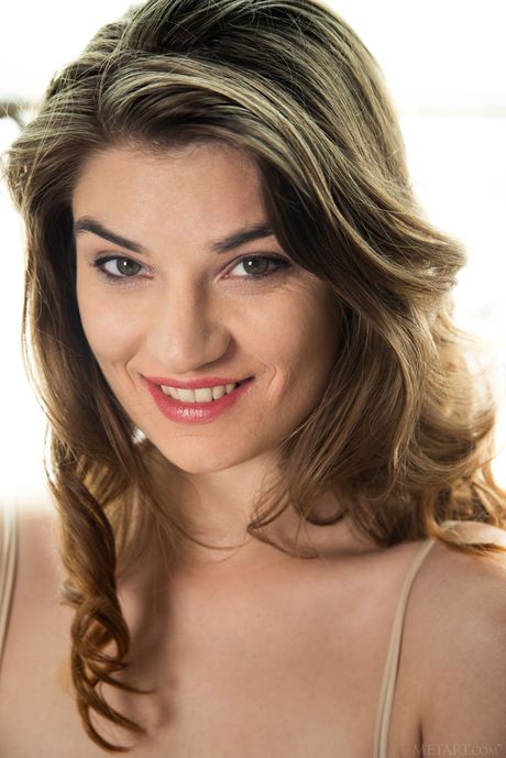 Delightful teen Kassi removes her lingerie to pose nude without embarrassment