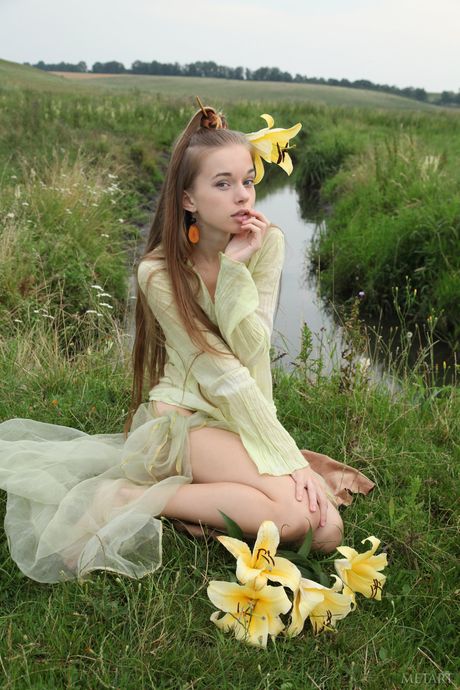 Petite teen Milena D exhibits perfect shape in the wilderness & shows her hairy pussy