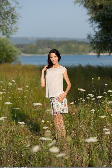 Ukrainian babe Adel Morel demonstrates her big tits and poses nude