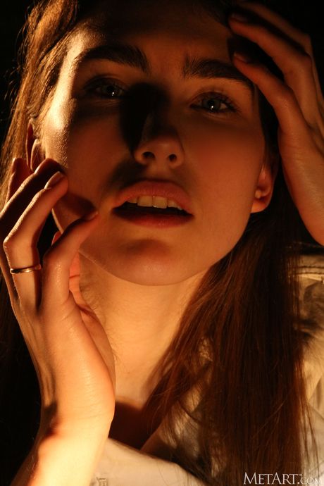 Desirable teen June removes her lingerie and high heels to pose nude in the car