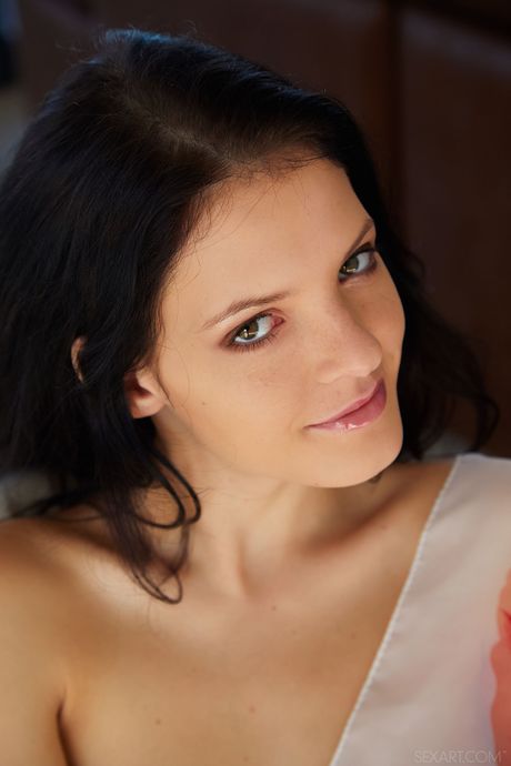 Anie Darling gets naked and masturbates in the kitchen