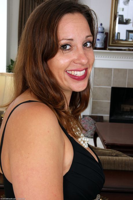 30 plus female Cassandra Johnson gets naked on a staircase