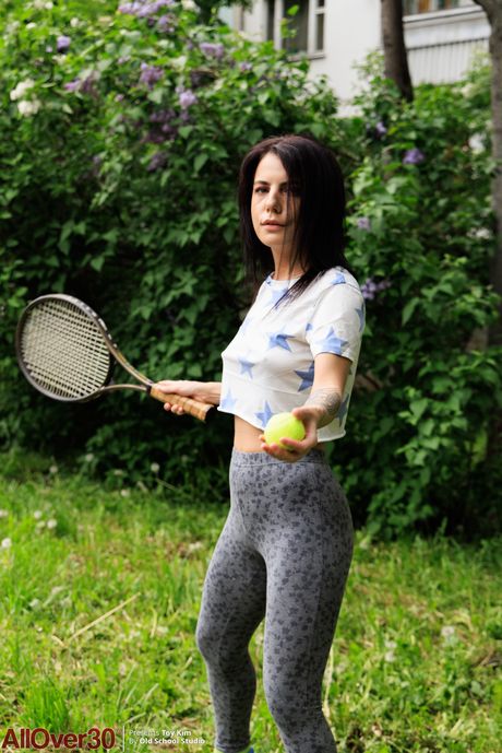 Mature Asian Toy Kim shows her big ass & her tasty pussy outdoors