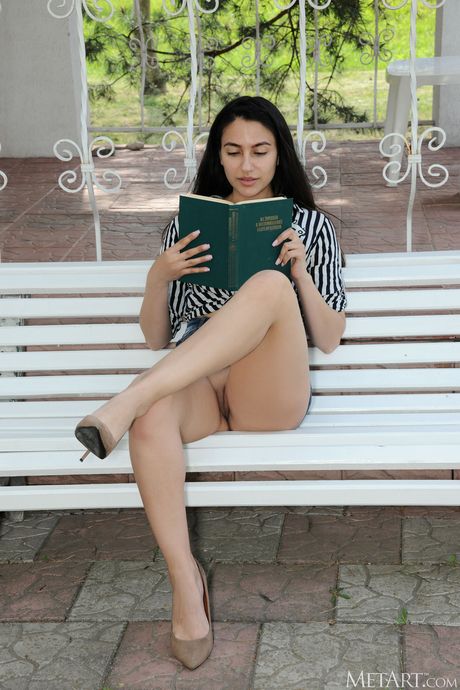 Intriguing teen Cira Nerri gets naked in the park and shows her hot body