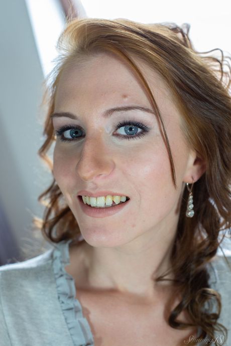 Svelte teen Hanka removes a thong and lingerie to pose nude on a bed