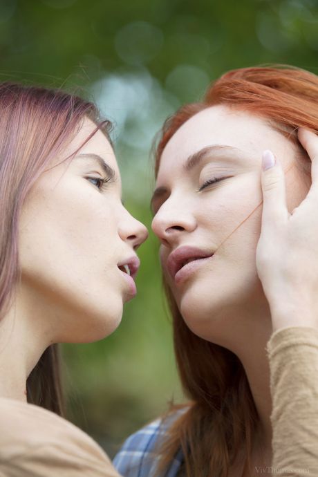 Amazing lesbians Eva Berger & Lovenia Lux kiss before licking pussies outdoors
