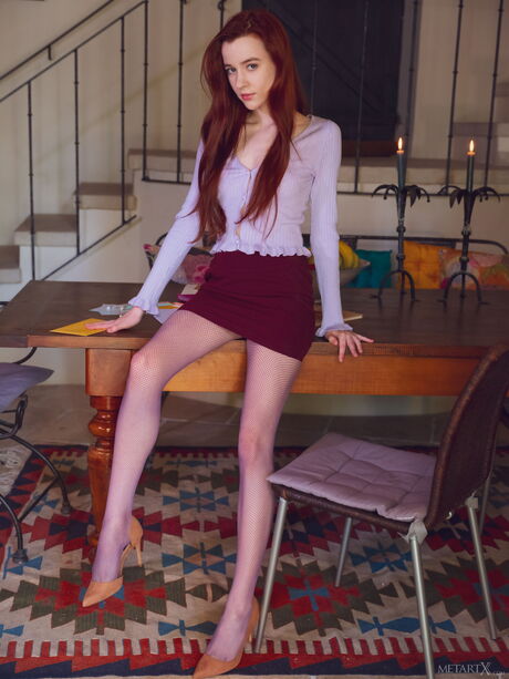 Sweet redhead Sherice fingers her pussy after getting naked