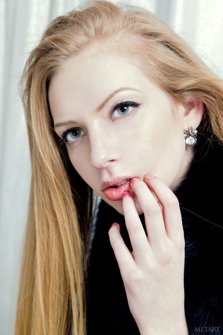 Skinny blonde Verona B removes her bikini and high heels to pose nude