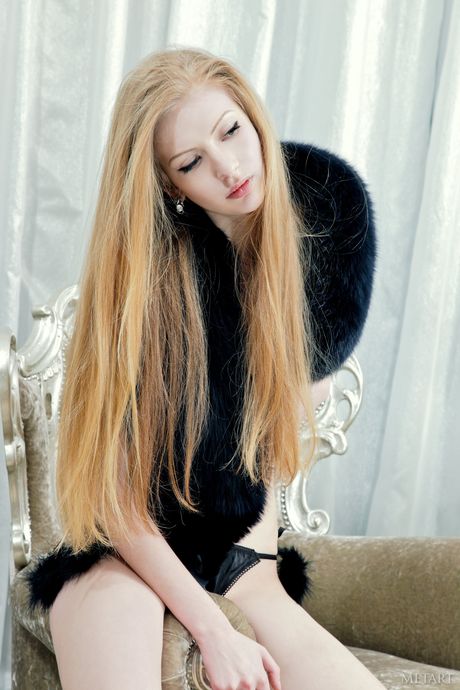 Skinny blonde Verona B removes her bikini and high heels to pose nude