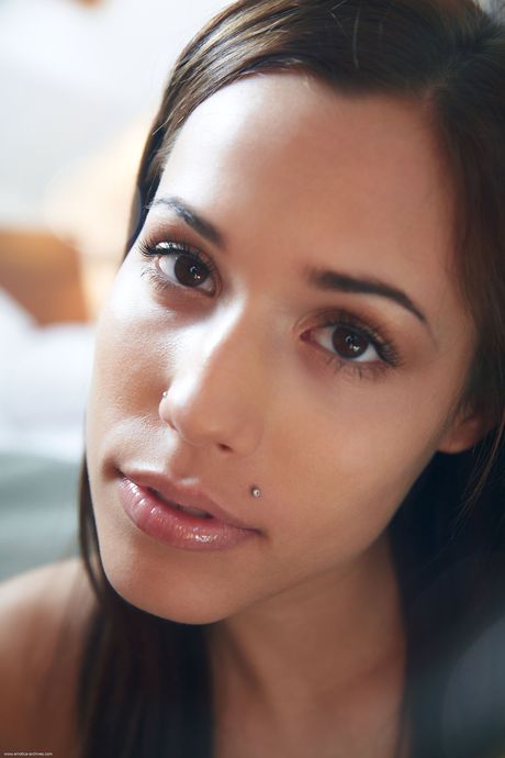 Brunette teen Satin Bloom removes her bikini to pose nude in high heels