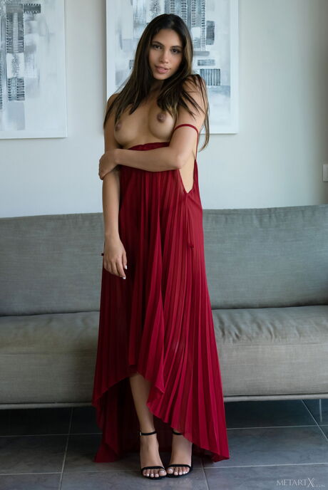 Lean teen Baby Nicols gets naked in high heels before fingering her pussy