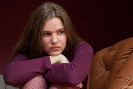 Aurika is a beautiful young girl with a slender figure and a petite