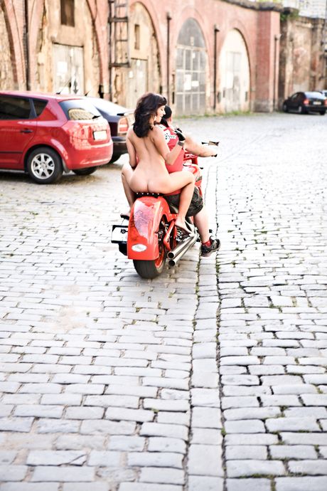 Tempting teen Tess strips off her gloves and motorcycle gear to pose nude