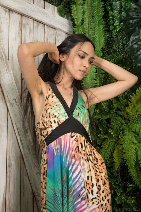 Delightful teen Rezza bares herself while showing off her hairy pussy