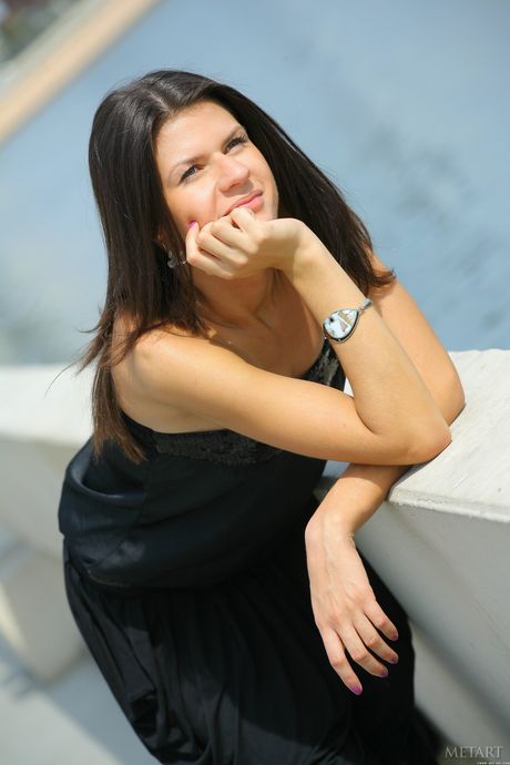 Alluring teen Sandra G removes her lingerie and poses naked