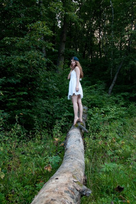 Nedda A takes off her white dress and exposes her naked body on the fallen