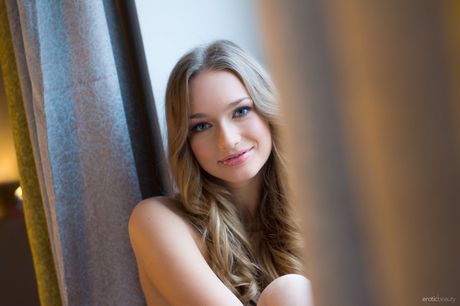 Tender teen with a pretty face Amy Moore poses nude without hesitation