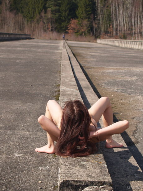 Attractive teen Agnes A strips naked in public & shows her tattooed body