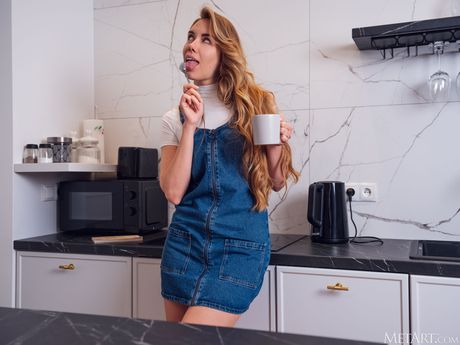 Ukrainian beauty Ryana gets naked in the kitchen and shows her big tits & twat