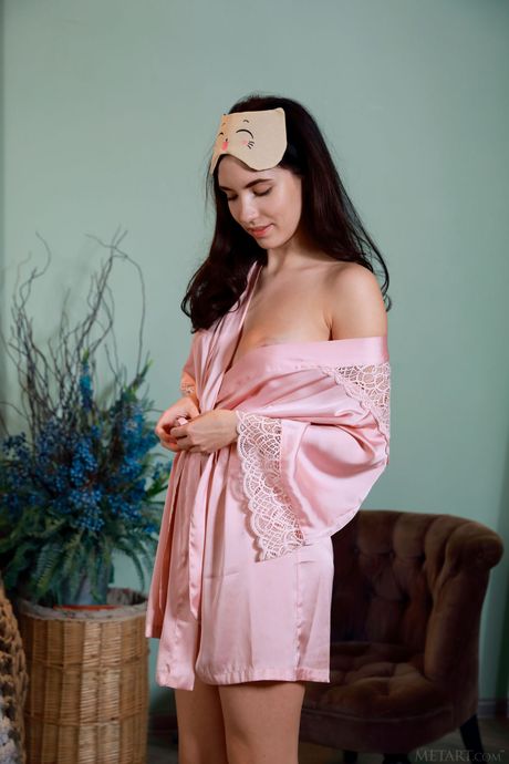 Attractive teen Velana removes her lingerie and blindfold to pose nude