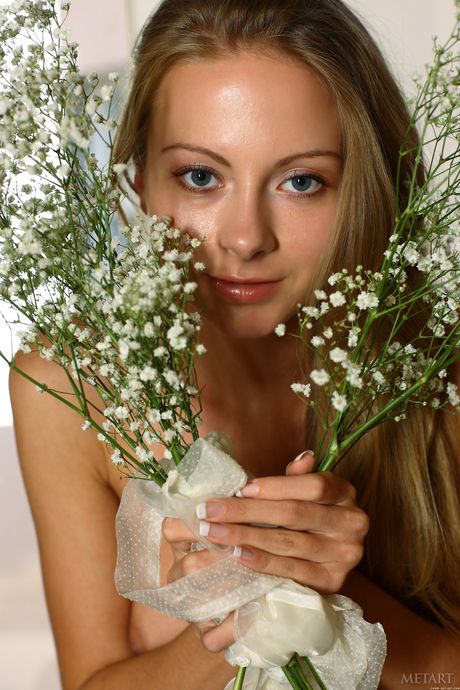 Ukrainian babe Frances A presents her big tits and poses naked