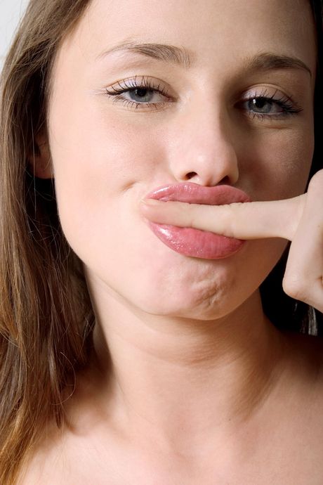 Brunette teen Lola bares it all on a kitchen counter by herself