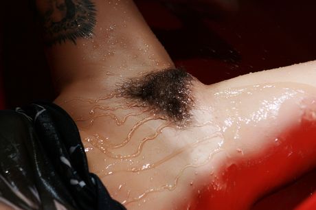 Blonde teen Roksya bares herself while taking a bath in a tub