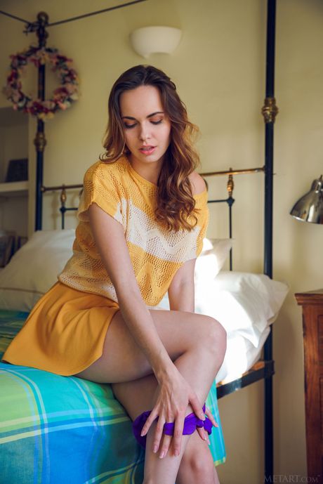 Petite teen Nasita removes a bikini and panties to get bare naked on a bed