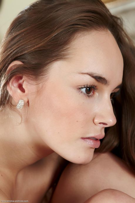 Russian fair Milena shows off her flexibility and nude body in a solo