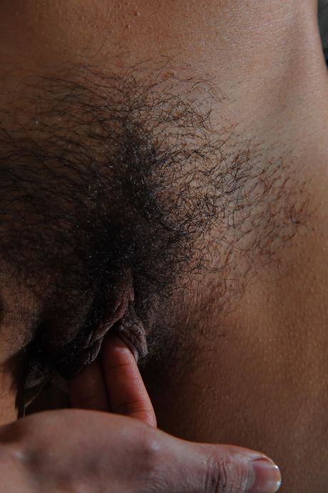 Natalia is a stunning beauty with a hairy pussy and a big booty