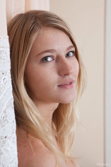 Skinny Ukrainian lovely Mila strips and teases with her tiny tits & pussy