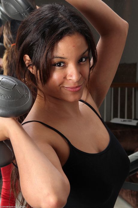 Sexy amateur Vera Waang shows her pierced pussy and tattooed body