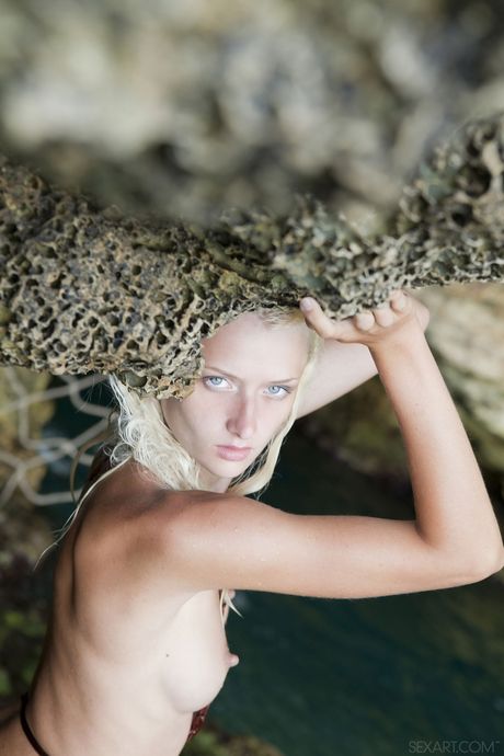 Ukrainian beauty Nika N squirting pussy juice outdoors on rocks