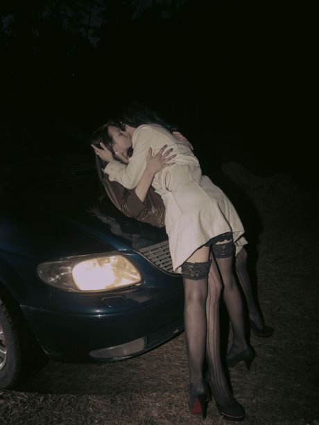 Sexy lesbians Lexi B & Helena J kiss before stripping to their stockings