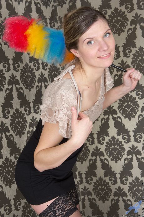 Sexy mature Agatha shows her hairy pussy and poses in stockings