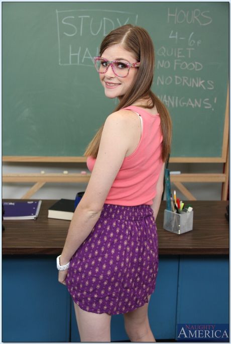 College girl Lara Brookes strips and shows her hairy pussy