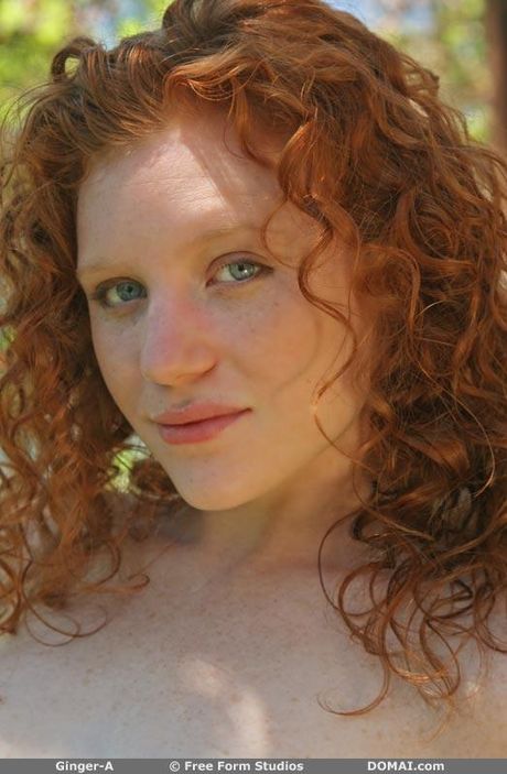 Natural redhead Ginger A displays her beautiful body in the nude