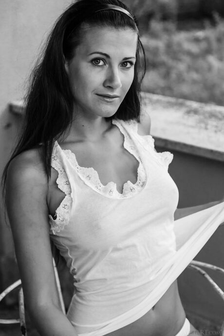 Attractive teen Lauren Crist strips her white bikini & shows her hot body outdoors