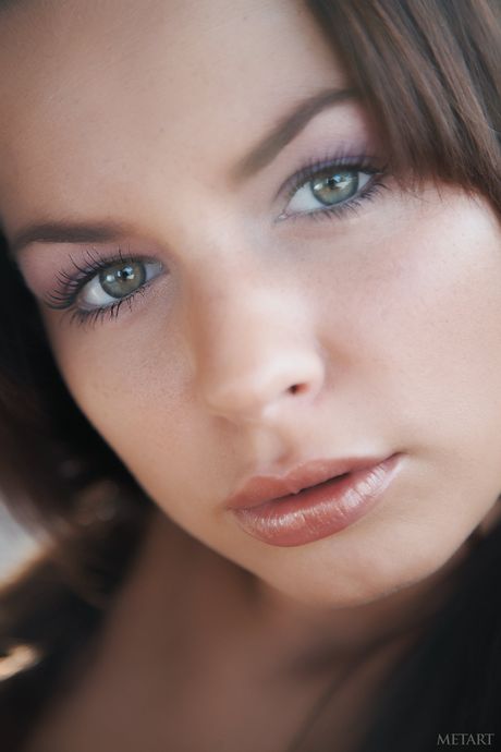 Nina A demonstrates her sexy body and tattoos in the kitchen