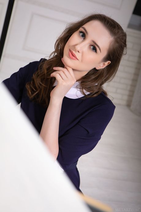 Ginger Frost removes her dress and blindfold to pose nude