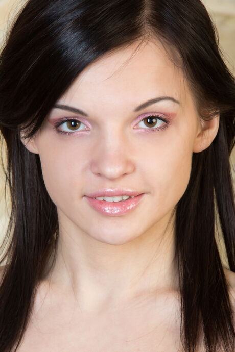 Svelte teen Vikki Mauri gets naked in white stockings and garters