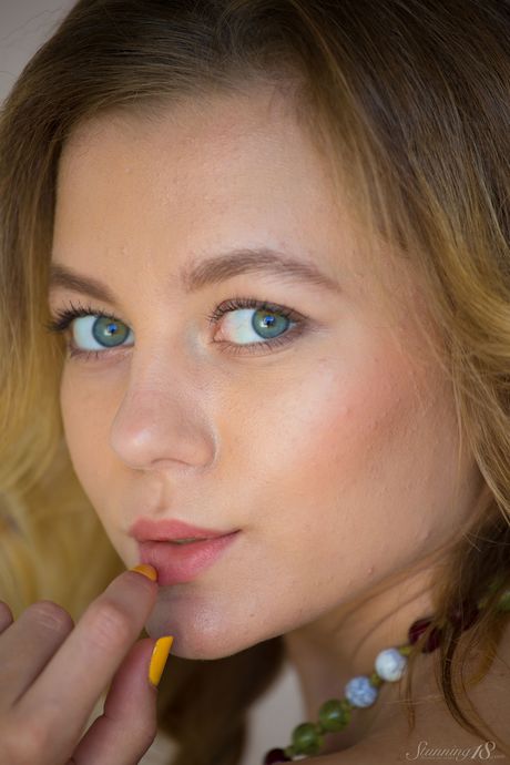 Tender teen Agnes frees her big tits and shaved pussy from a black dress