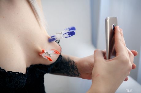 Blonde model Kate Fresh takes selfies before masturbating with a vibrator